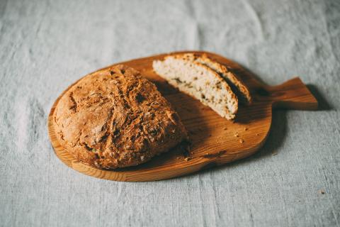 Bread. The Thai for "bread" is "ขนมปัง".